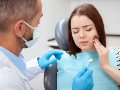 woman with toothache in a dental clinic